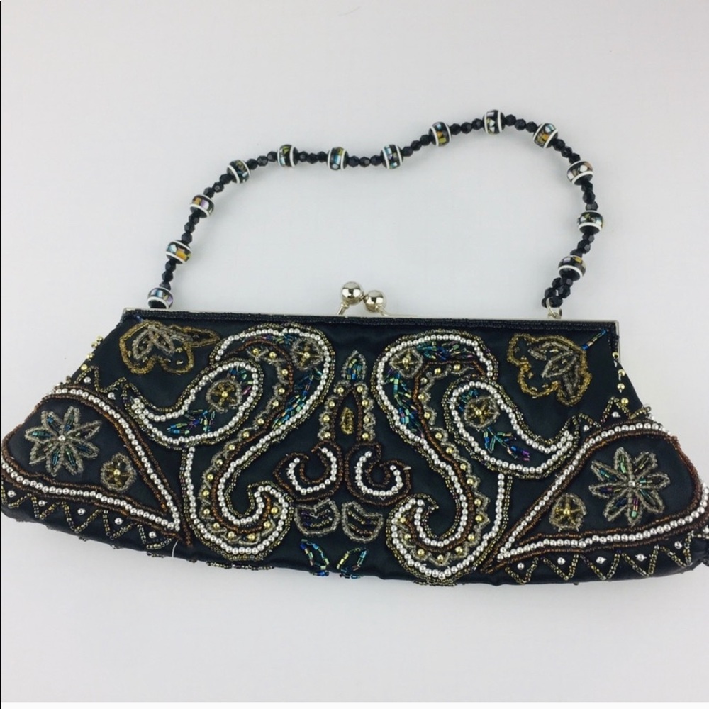 Clutch purse black with silver beating bea…